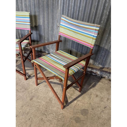 72 - A pair of folding directors style chairs