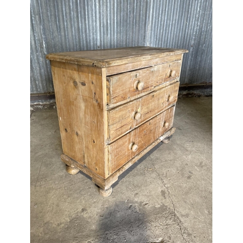 84 - A small antique pine chest of four drawers