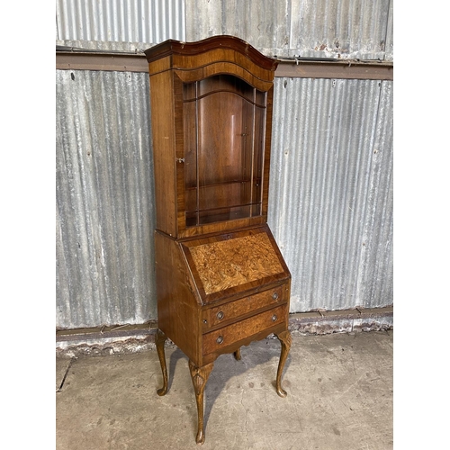 85 - A reproduction walnut bookcase bureau