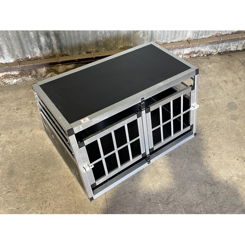 87 - An aluminium framed two door pet transit crate