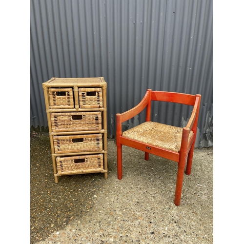 9 - A bamboo chest of five drawers together with a rush seat chair