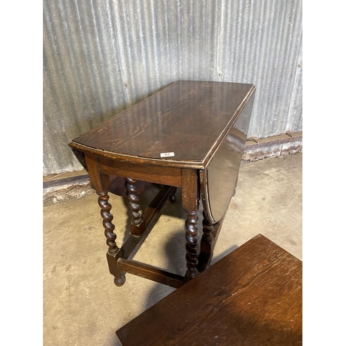 95 - An oak gate leg table together with an oak nest of three