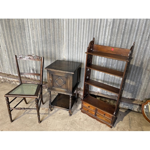 98 - A mahogany wall shelf, oak bedside and a begere chair