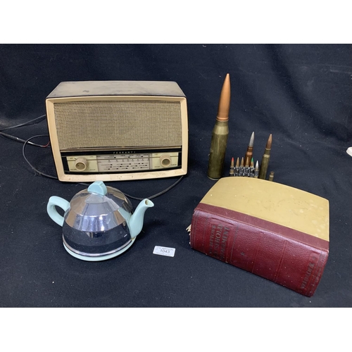 1043 - Bakelite radio, Mrs Beeton's Household Management book & Teapot, Brass shells