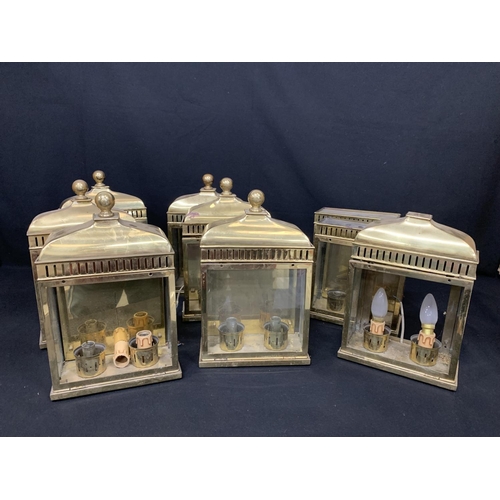 516 - 9 heavy brass wall lanterns, each 23 x11 x 37cms, some a/f