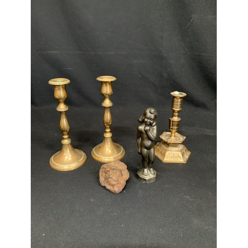 554 - Pair of Swedish brass candlesticks height 21 cms & one other, metal girl figure and metal lion fixin... 