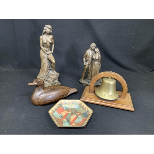 625 - Brass bell on stand, 2 heavy resin figures, heavy hardwood duck and enamel dish