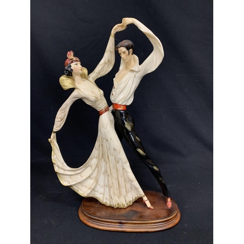 629 - Dancing couple Figure by A Santini, height 50cms