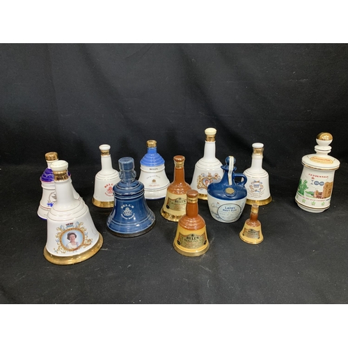 648 - 10 Bells Whisky Decanters with contents, Lambs Navy Rum decanter and contents and Bourbon Whisky emp... 