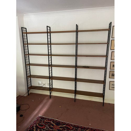 20 - A 4 bay mid centuey ladderax sectional bookcase system by staples