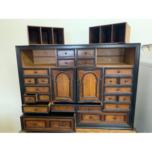 288 - 19th Century Continental Walnut and Ebonised Collectors Cabinet on stand, cabinet enclosing chequer ... 