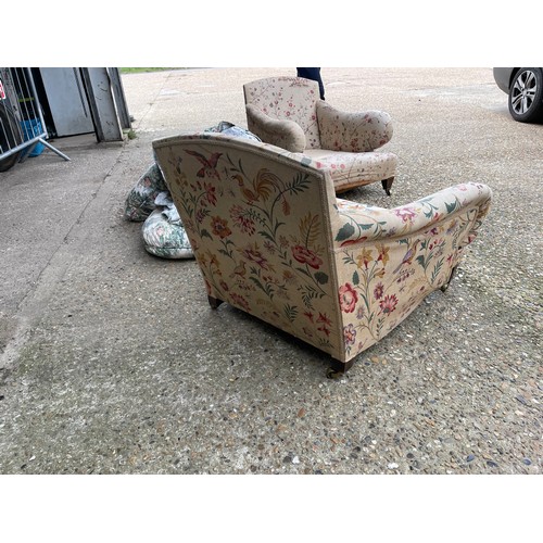 289 - A pair of deep seated country house armchairs chairs raised in square form tapering legs and brass c... 