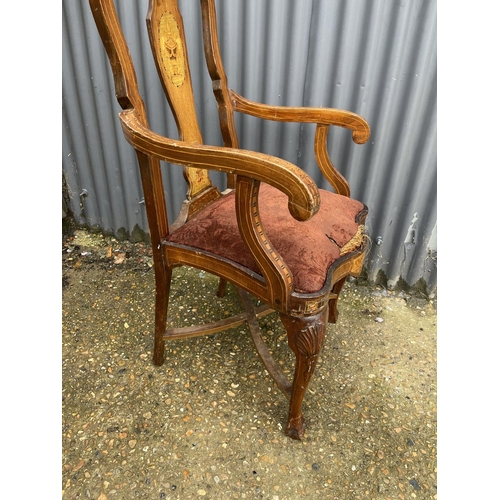 109 - A continental antique inlaid carver chair