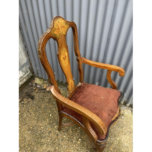 109 - A continental antique inlaid carver chair
