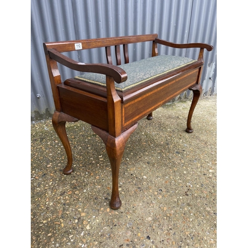 112 - An Edwardian inlaid piano stool with green upholstered seat