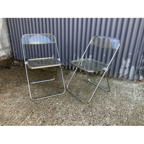 119 - A pair of Italian chrome and Perspex folding chairs by PIA Costelli ITALY