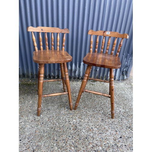 126 - A pair of pine bar stools