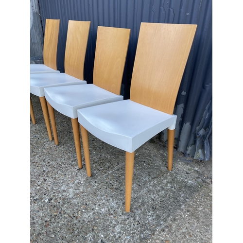 129 - A set of four modern kitchen chairs labelled MISS TRIP for Kartell