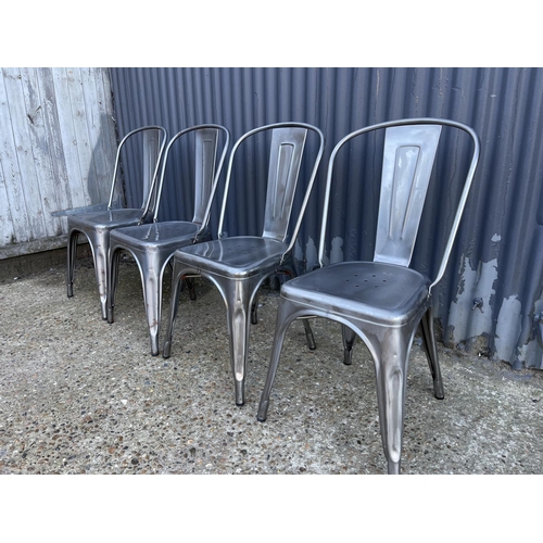 132 - A stack of four french metal bistro chairs by TOLIX