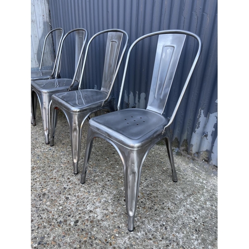 132 - A stack of four french metal bistro chairs by TOLIX