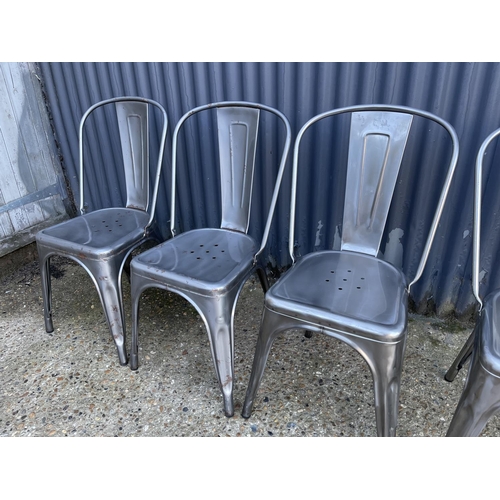 132 - A stack of four french metal bistro chairs by TOLIX