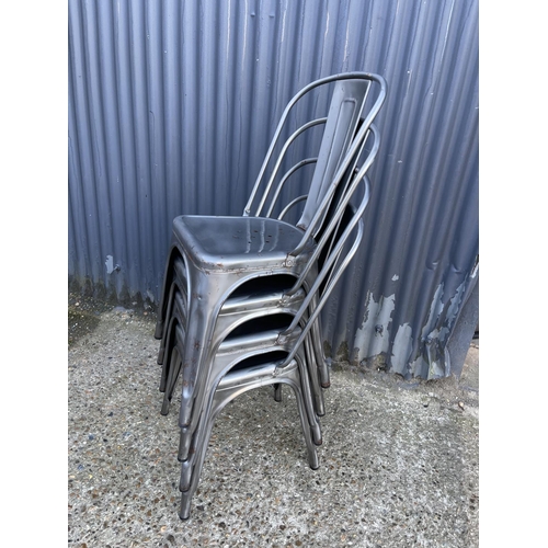 132 - A stack of four french metal bistro chairs by TOLIX