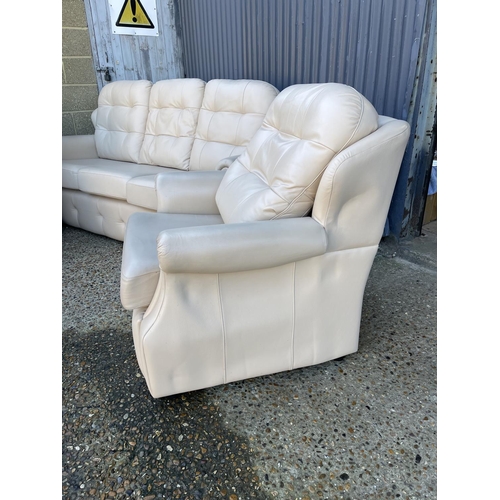 145 - A g plan white leather three piece lounge suite with sofa, two chairs and a footstool