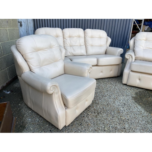 145 - A g plan white leather three piece lounge suite with sofa, two chairs and a footstool