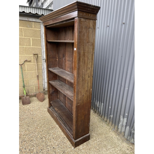 158 - An Edwardian pine open fronted bookcase with five adjustable shelves