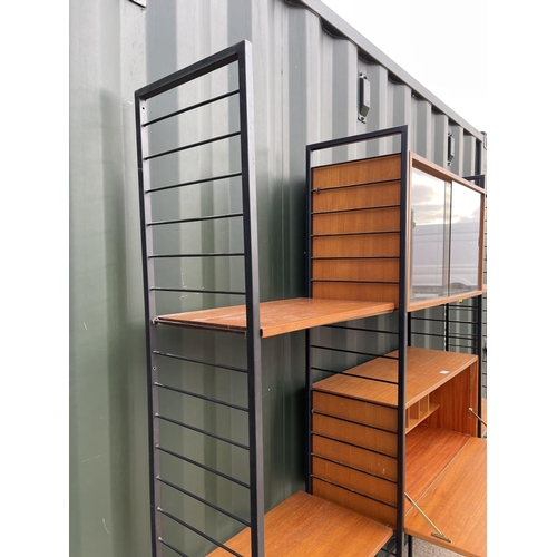 16 - A mid century ladderax home office storage system by staples. Central bureau and cabinet sections fl... 