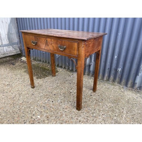 163 - A Georgian mahogany single drawer lowboy table