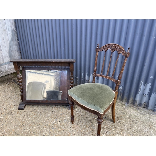 164 - An oak swing mirror and a rosewood chair