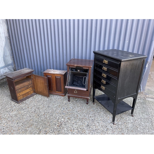 176 - An ebonised music cabinet,  coal box, and two oak wall cabinets
