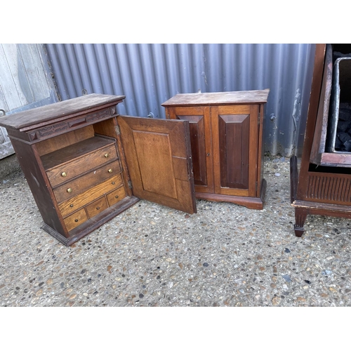 176 - An ebonised music cabinet,  coal box, and two oak wall cabinets