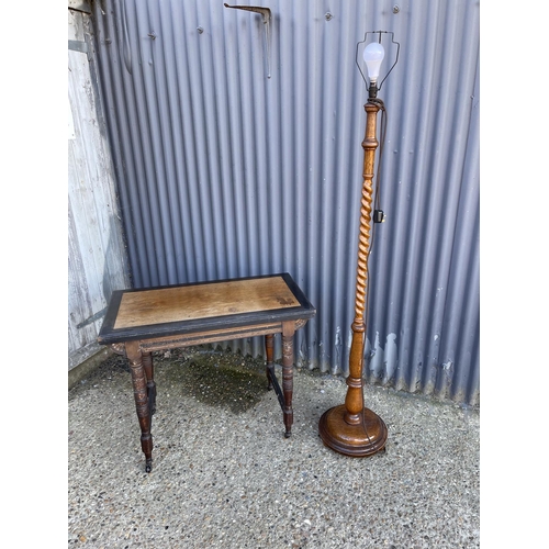 178 - An Edwardian fold over card table together with an oak standard lamp