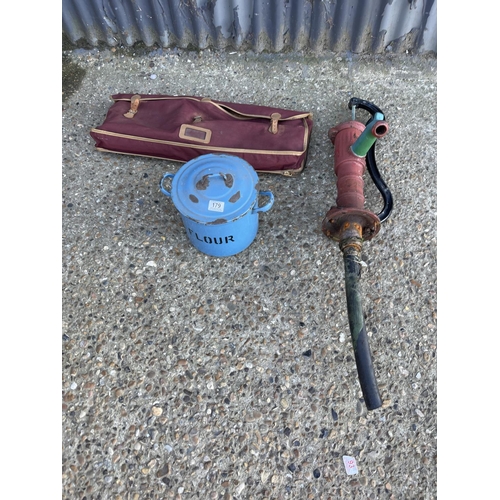179 - Vintage tin , well pump and 2 rackets