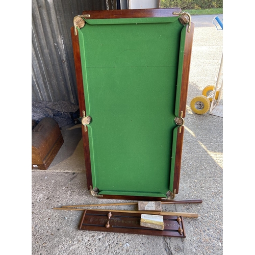 181 - A slate bed table top snooker table with cues, balls and score board 72x119