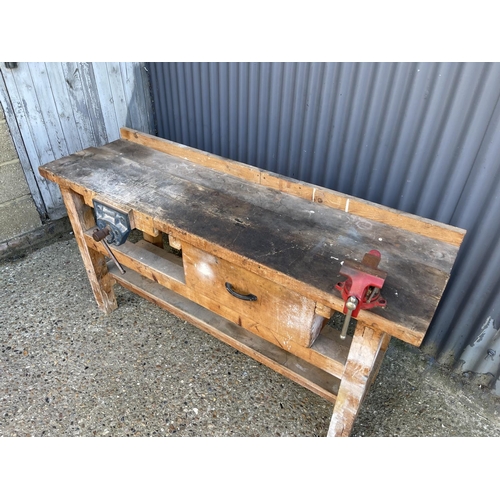 186 - Wooden workbench with two vices