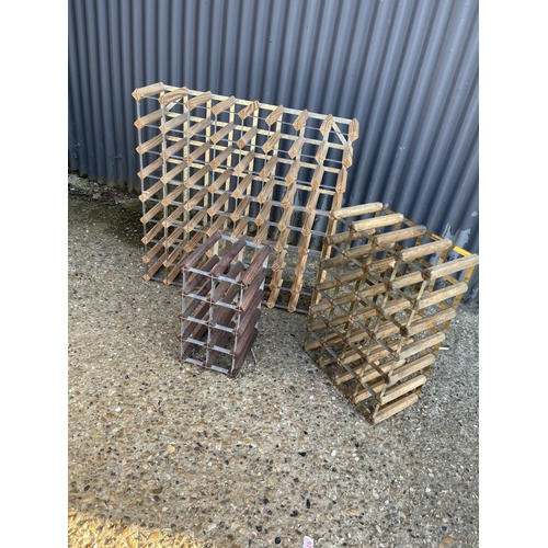 198 - Three wooden wine racks