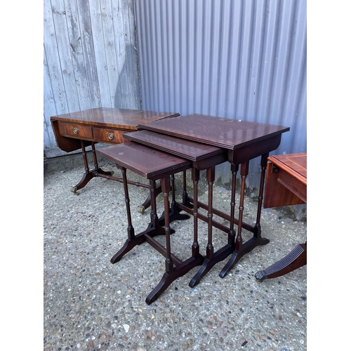 205 - A reproduction mahogany nest of three together with two mahogany side tables