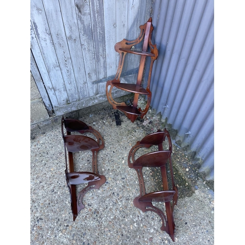 208 - Three reproduction mahogany corner wall shelves