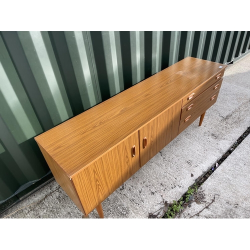 3 - A mid century teak effect sideboard