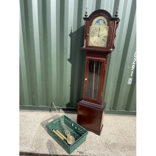31 - A reproduction mahogany long case clock