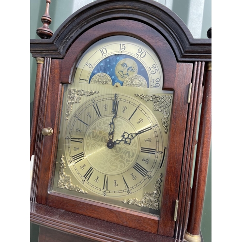 31 - A reproduction mahogany long case clock