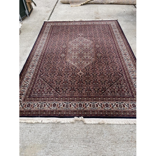 34 - A large red blue and gold pattern carpet 250x350