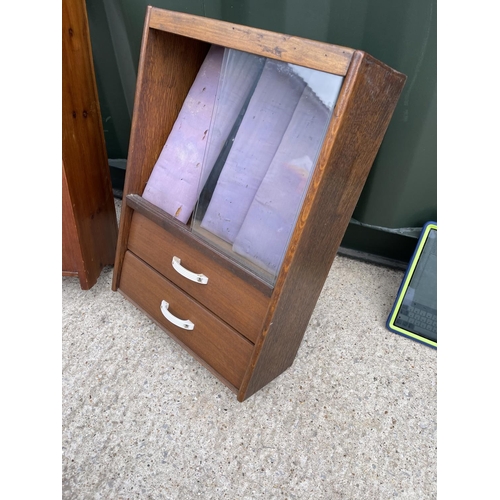 38 - An oak wall hanging medal cabinet together with a pine wall shelf