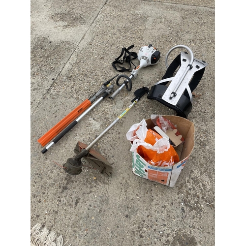 430 - A stihl km 56 RC multitool hedge cutter / strimmer and harness