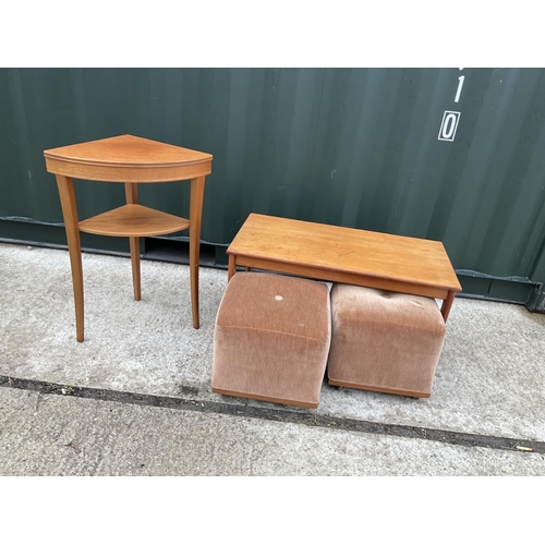 49 - A g plan style nest of three tables together with a teak corner table