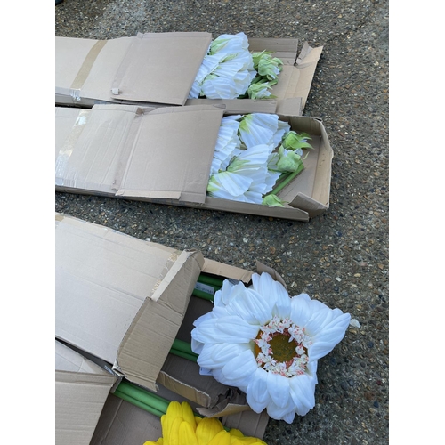75 - Four large boxes each containing 6 stems of artifical flowers (sunflower, gerbra etc)