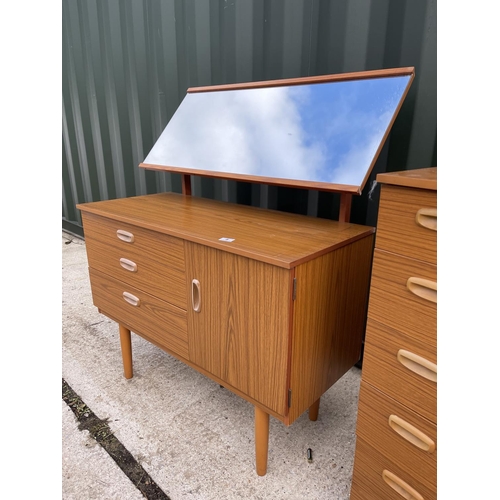 8 - A mid century teak effect bedroom pair consisting of a tallboy chest of five and a dressing chest